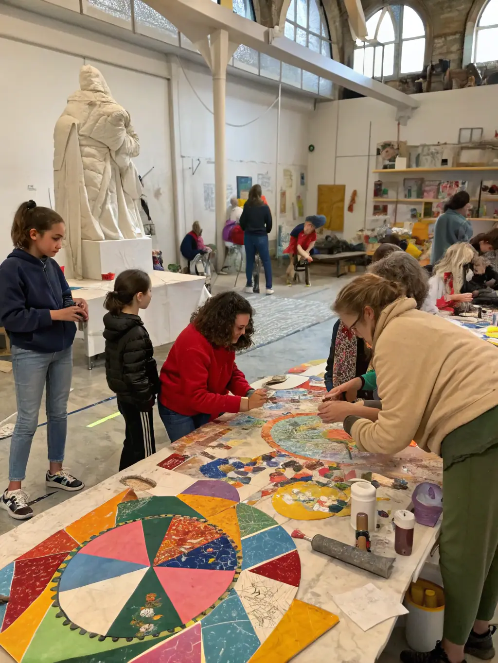 An inspiring image of a MON AMOUR educational workshop, featuring participants learning new skills and engaging in creative activities. The scene emphasizes the organization's dedication to providing access to culture and education.